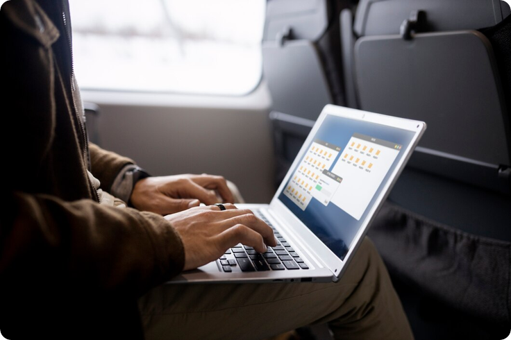 Screenshot 2026-09-20 at 11-29-58 Man working on his laptop while traveling by train Free Photo